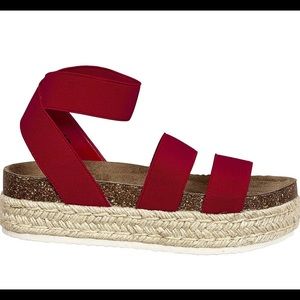 Red espadrille platforms